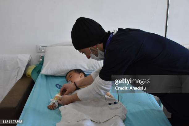 Kid receives a medical treatment at Afrin Hospital in Syria's Afrin, which was cleared from YPG/PKK-Daesh terrorists within the Olive Branch...