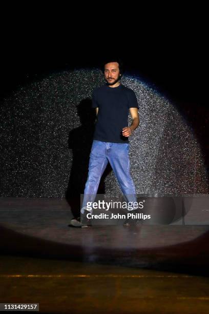 Fashion designer Marco De Vincenzo acknowledges the audience at the end of the his show at Milan Fashion Week Autumn/Winter 2019/20 on February 22,...