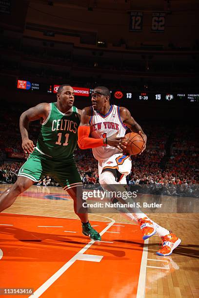 Amar'e Stoudemire of the New York Knicks drives to the basket against Glen Davis of the Boston Celtics in Game Four of the Eastern Conference...