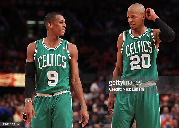 Rajon Rondo and Ray Allen of the Boston Celtics talk on court against the New York Knicks in Game Four of the Eastern Conference Quarterfinals during...