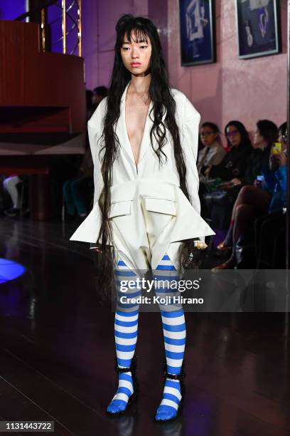 Model showcases designs on the runway during the JENNYFAX show as part of Amazon Fashion Week TOKYO 2019 A/W at Shibuya Hikarie Hall on March 18,...