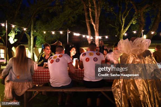 Campers eat a bar-be-que dinner before the Talent Show at Camp TAZO on March 15, 2019 in Marble Falls, Texas.