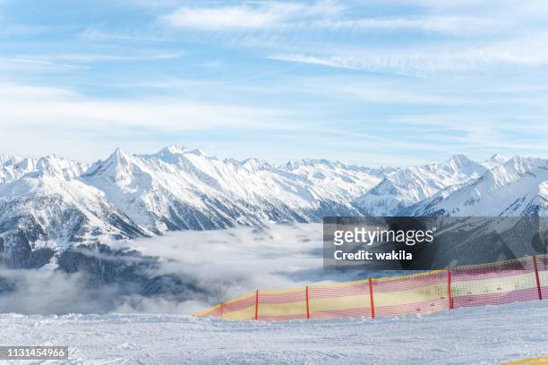 skiiing at zillertal - mountain snow panorama - tirol nebel stock pictures, royalty-free photos & images