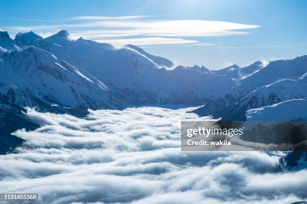 skiiing at zillertal - mountain snow panorama - tirol nebel stock pictures, royalty-free photos & images