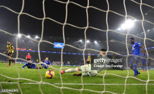 Watford striker Troy Deeney scores the 5th Watford goal past Neil Etheridge during the Premier League match between Cardiff City and Watford FC at...