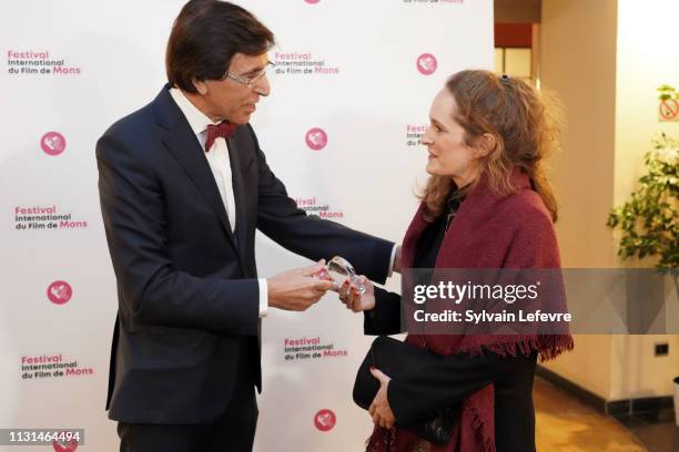 Elio Di Rupo and Sarah Hirtt attend closing ceremony of 34th Mons International Film Festival on February 22, 2019 in Mons, Belgium.