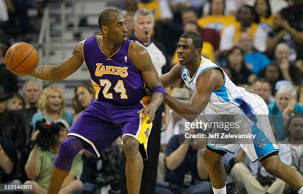 Chris Paul of the New Orleans Hornets guards Kobe Bryant of the Los Angeles Lakers in Game Four of the Western Conference Quarterfinals in the 2011...