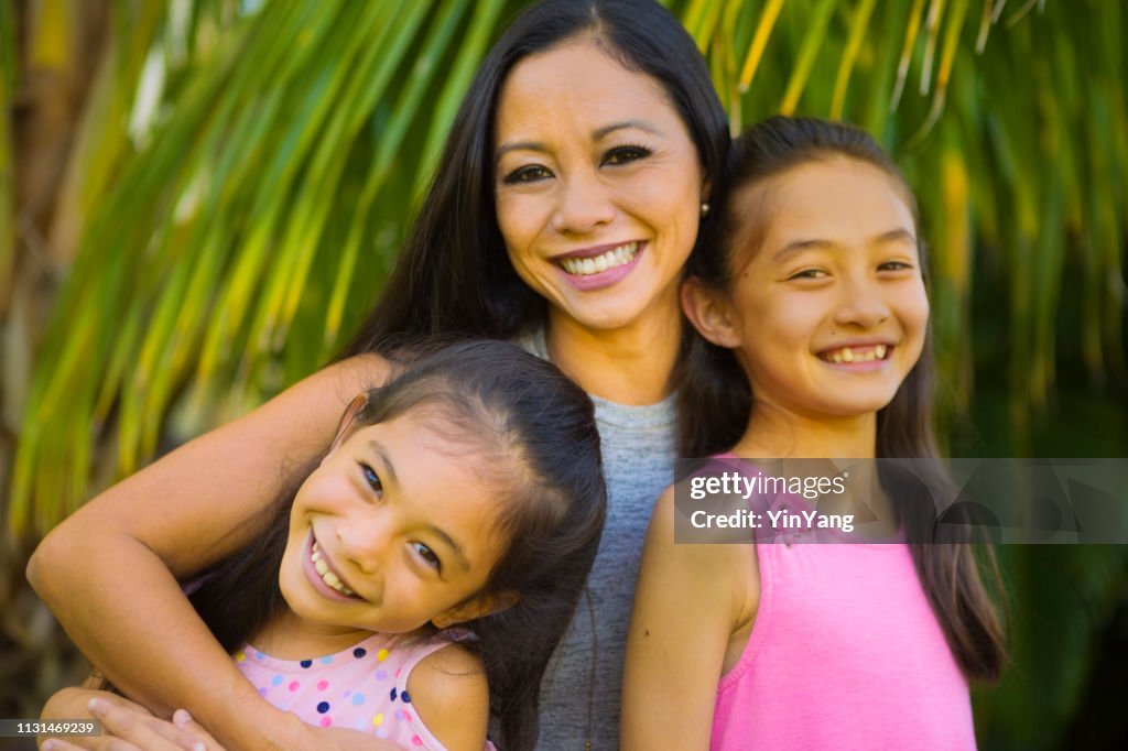 Hawaiian Family Outdoor Portrait with Mother, Two Preteen Adolescent Girls