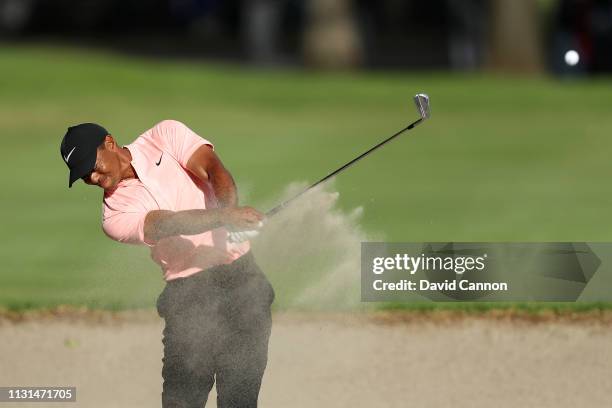 Tiger Woods of the United States plays his second shot on the ninth hole during the second round of World Golf Championships-Mexico Championship at...