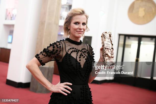 Karin Viard poses with the Cesar for Best Actress in a Supporting Role award for the film 'Les Chatouilles' during the Cesar Film Awards 2019 at...