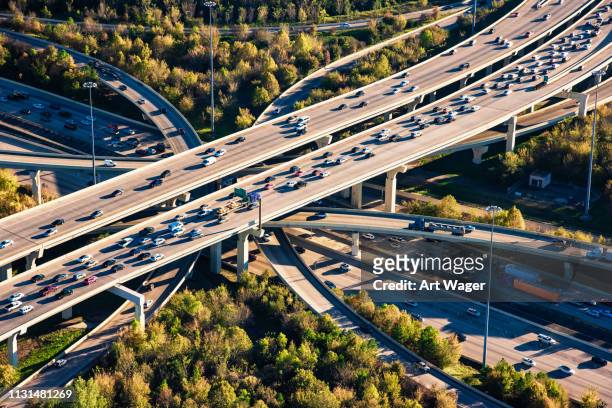 houston freeway interchange aerial - houston texas stock pictures, royalty-free photos & images