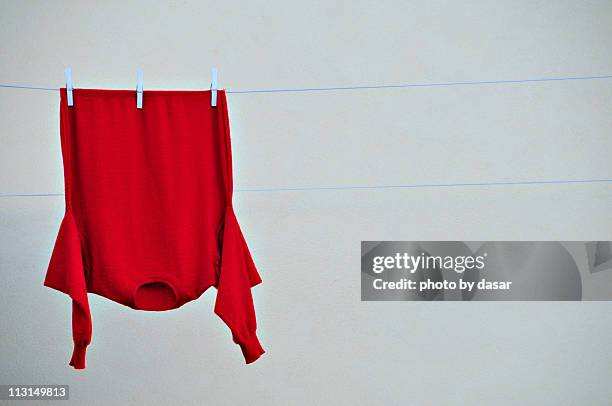 laundry - hanging clothes stock pictures, royalty-free photos & images