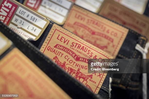 Levi Strauss & Co. Labels are seen on jeans for sale inside the company's flagship store in San Francisco, California, U.S., on Monday, March 18,...