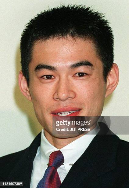 Japanese professional baseball player Ichiro Suzuki of the Orix Bluewave, smiles during a press conference after he signed a contract with his team...