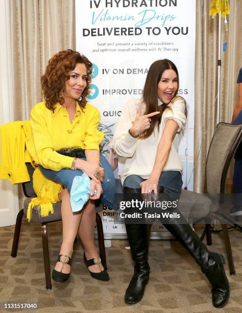 Claudia Wells and Janice Dickinson attend Debbie Durkin's EcoLuxe Lounge Honoring Film Nominees at The Beverly Hilton Hotel on February 22, 2019 in...