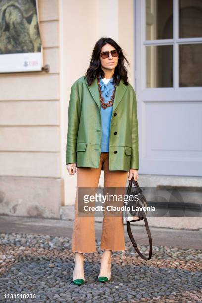 Deborah Reyner Sebag, wearing green jacket, is seen outside Tod's on Day 3 Milan Fashion Week Autumn/Winter 2019/20 on February 22, 2019 in Milan,...