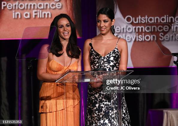 Actresses Melissa Fumero and Stephanie Beatriz speak onstage during