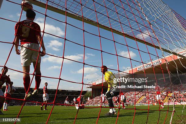 David Clarkson of Bristol City fails to head clear as Luke Chambers scores the winning goal during the npower Championship game between Bristol City...