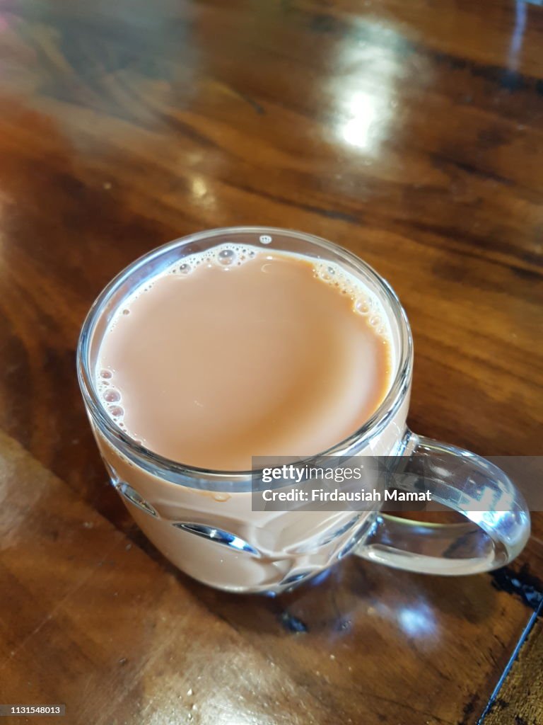 Teh tarik or known Malaysian milk tea