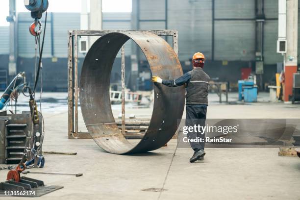 steel seamless rolled ring forging - dirty construction worker stock pictures, royalty-free photos & images