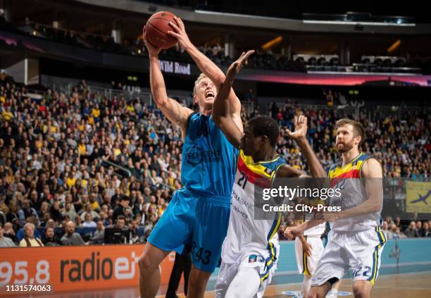 Luke Sikma of Alba Berlin, Moussa Diagne and John Shurna of BC Morabanc Andorra during the EuroCup semifinal match between Alba Berlin and Morabanc...