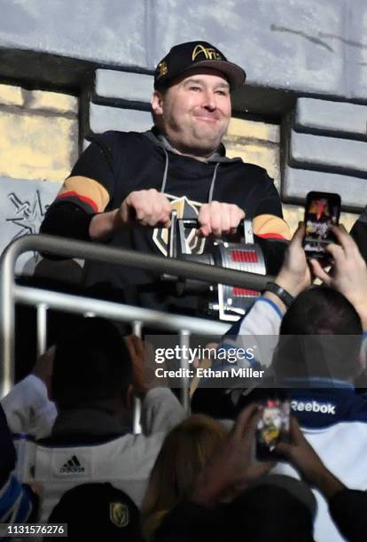 Professional poker player Phil Hellmuth sounds a siren in the Castle before the start of a game between the Winnipeg Jets and the Vegas Golden...