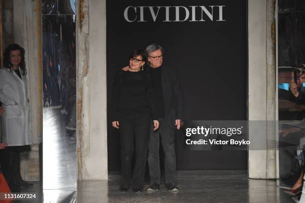 Designers Miriam Cividini and Piero Cividini acknowledge the applause of the public after the Cividini show at Milan Fashion Week Autumn/Winter...