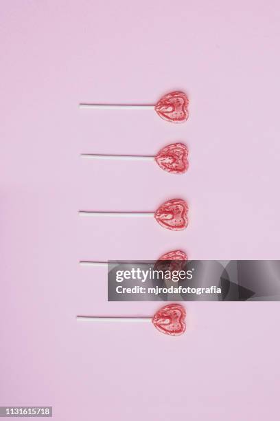 amorous lollipops - feminidad stock-fotos und bilder