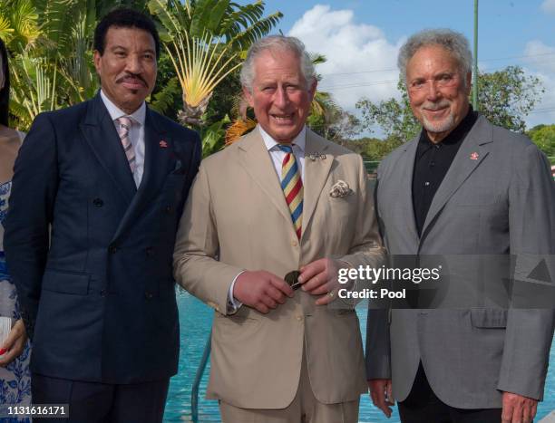 Lionel Richie, Prince Charles, Prince of Wales and Sir Tom Jones attend a Prince's Trust International Reception at the Coral Reef Club Hotel on...