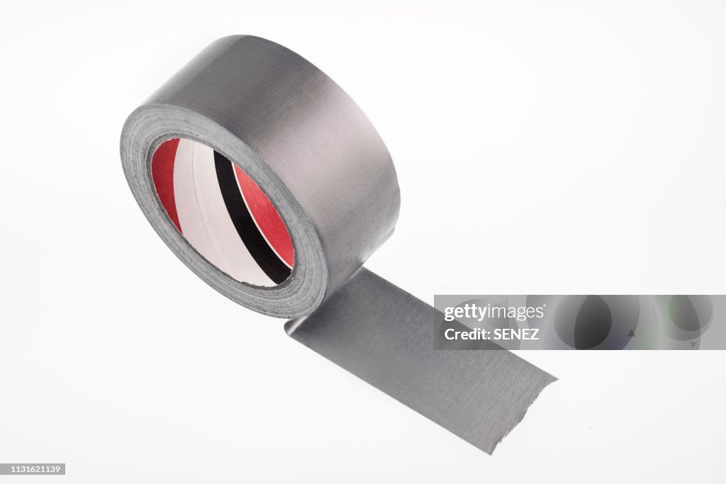 Close-Up Of Adhesive Tape Against White Background