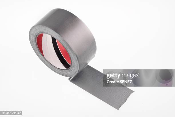 close-up of adhesive tape against white background - duct tape stockfoto's en -beelden