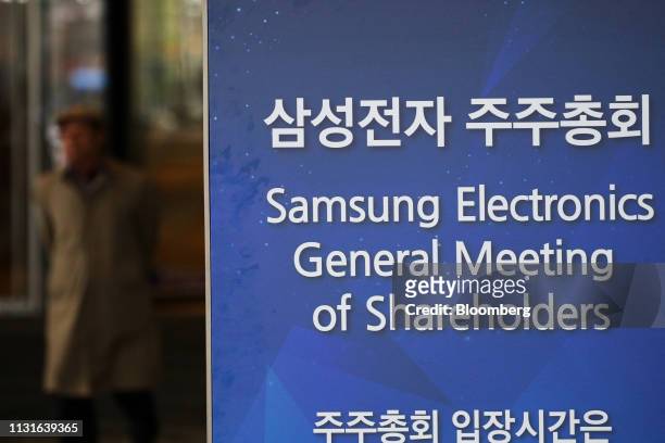 Sign for the Samsung Electronics Co. Annual general meeting is displayed at the company's Seocho office building in Seoul, South Korea, on Wednesday,...