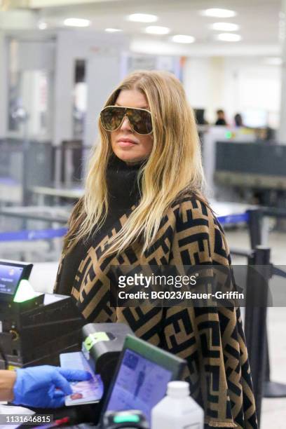Fergie is seen at Los Angeles International Airport on March 19, 2019 in Los Angeles, California.