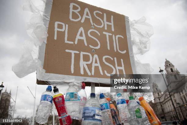 Anti plastics protester stands in the street in Westminster demonstrating against the overuse of plastic in society and calling for a ban in London,...