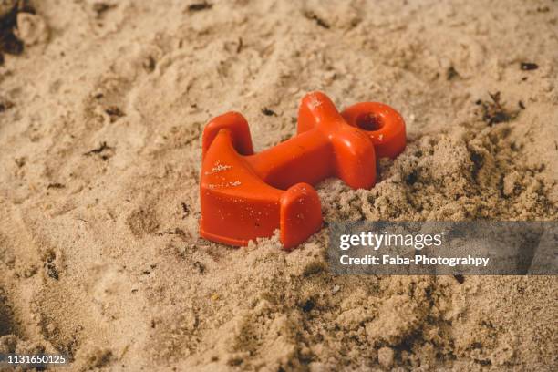 sandbox with toys - plastikmaterial stock pictures, royalty-free photos & images