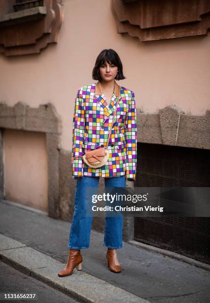 Maria Bernad is seen wearing plaid jacket, Loewe bag, denim jeans outside Vivetta on Day 2 Milan Fashion Week Autumn/Winter 2019/20 on February 21,...