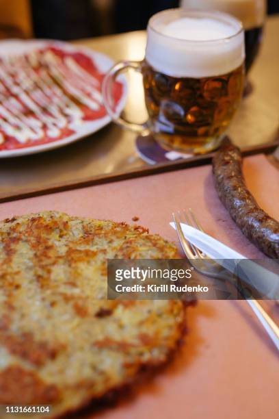 traditional czech food – bramborak and sausage and a glass of beer - czech republic food stock pictures, royalty-free photos & images