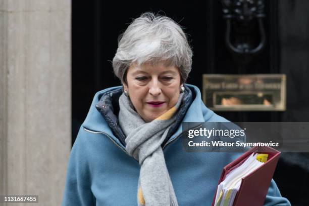 British Prime Minister Theresa May leaves 10 Downing Street in central London for the weekly PMQ session in the House of Commons. Prime Minister is...