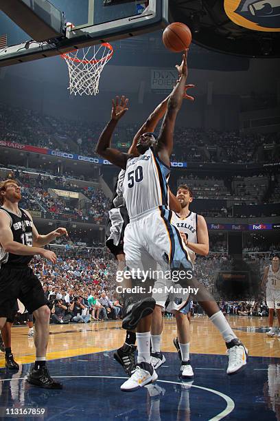 Zach Randolph of the Memphis Grizzlies shoots against Tim Duncan of the San Antonio Spurs in Game Four of the Western Conference Quarterfinals in the...
