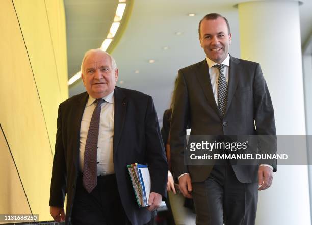 Chairman of the European People's Party Manfred Weber and EPP President Joseph Daul arrives for a European Peoples Party meeting concerning Hungary's...
