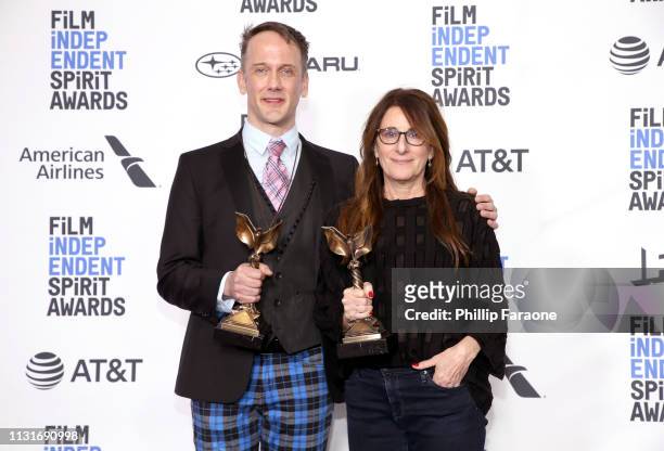 Jeff Whitty and Nicole Holofcener pose in the press room with the Best Screenplay award for the film “Can You Ever Forgive Me?” during the 2019 Film...