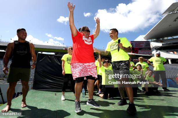 Former All Black Keven Mealamu and Dave Letele of BBM hand out prizes after taking part in the World's Biggest Bootcamp on Eden Park on February 24,...