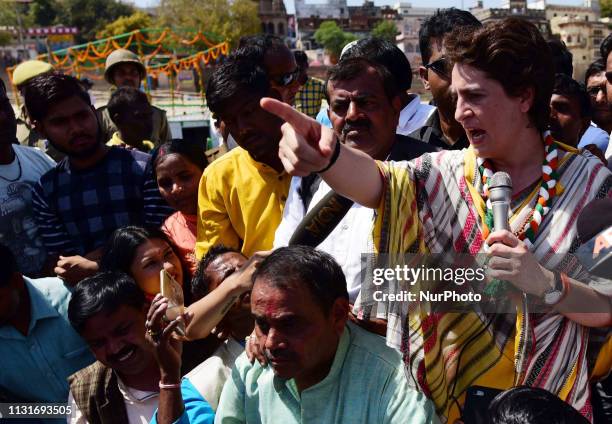 Congress party General Secretary and eastern Uttar Pradesh state in-charge Priyanka Gandhi Vadra speaks with local people of varanasi during the last...