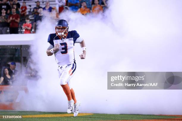 Quarterback Garrett Gilbert of the Orlando Apollos runs onto the field before playing against the Memphis Express during the Alliance of American...