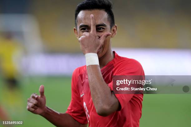 Muhammad Faris Ramli of Singapore celebrates after scoring their 1st goal during the Airmarine Cup match between Malaysia and Singapore at Bukit...