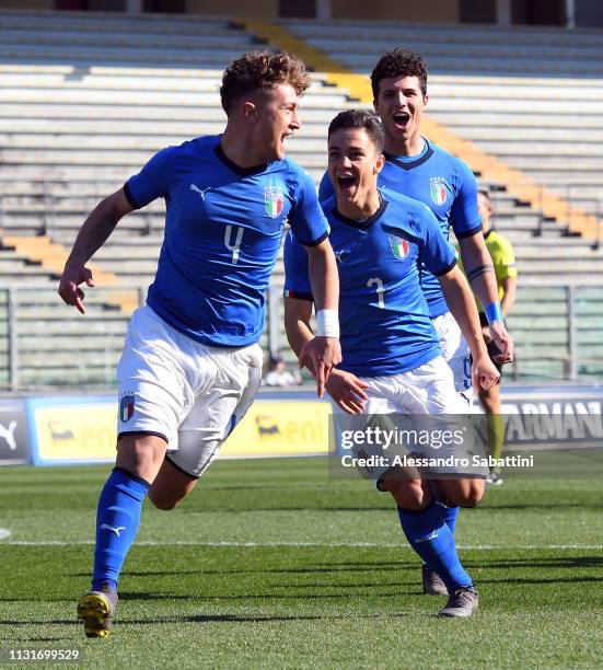 Salvatore Esposito of Italy U19 celebrates after scoring the opening goal with teammates during the UEFA Elite Round match between Italy U19 and...