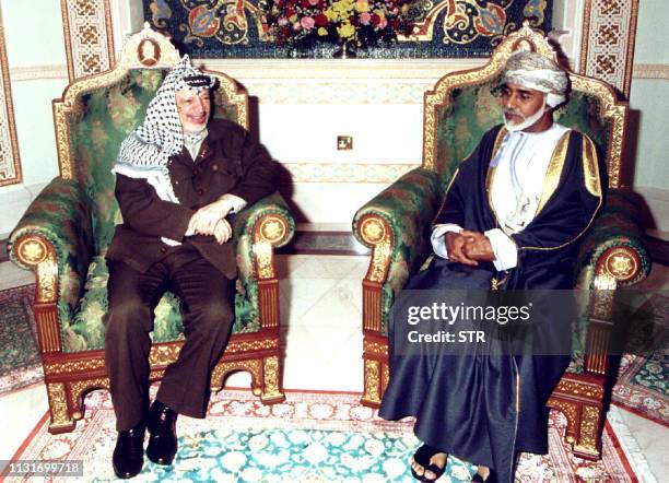 Palestinian leader Yasser Arafat meets with Oman's Sultan Qaboos 03 May 2000 in Muscat, where they discussed ways to advance the Middle East peace...