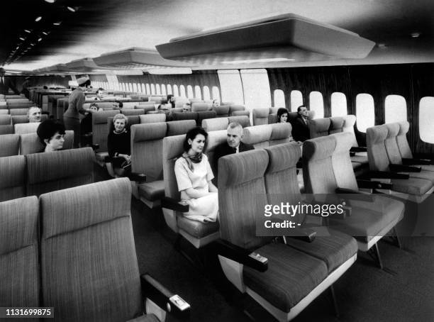 Picture shows model of an Air France Boeing 747 Jumbo Jet interior with passengers on September 18, 1966. Interior arrangement presents a passenger...