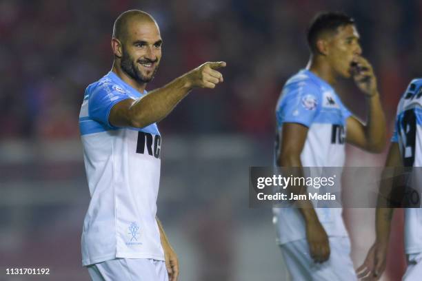 Lisandro Lopez de Racing Club celebratesafter scoring the second goal of his team via penalty during a match between Independiente and Racing Club as...