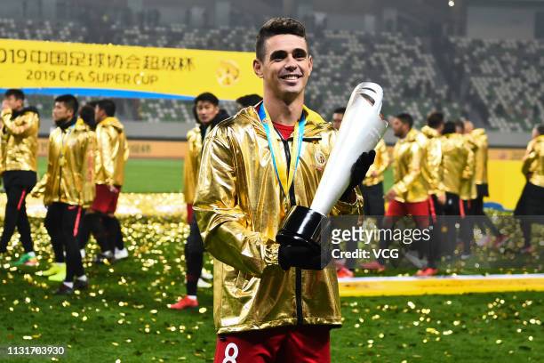 Oscar of Shanghai SIPG celebrates during the award ceremony of the 2019 Chinese Football Association Super Cup between Shanghai SIPG and Beijing...